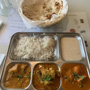 Daily lunch special. Choose 3 entree items, Naan and Dessert