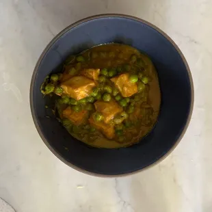 The paneer and peas.