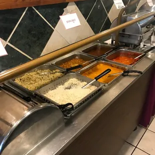 a buffet with a variety of food items