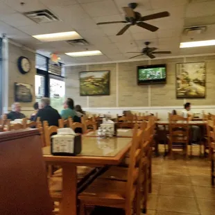 Simple decor and cozy family sized tables and booths for couples.  Tables were every other due to COVID so they are social distancing