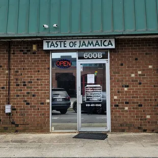 the entrance to a restaurant