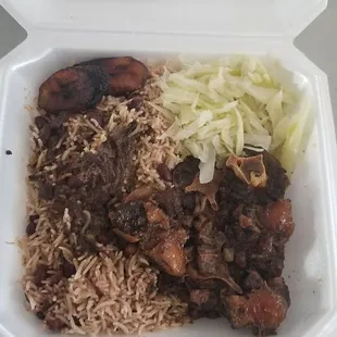 Ox tail with cabbage and rice and beans