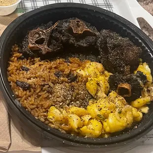 This is half of a large plate oxtail plate , that one of my employees split with me ). their plates can easily feed 2 adults