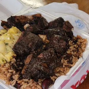 Oxtails over rice and peas with mac and cheese  Taken 02.03.25