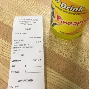 Ox tail and jerk chicken with fries and a soda.  Too much for the little I got