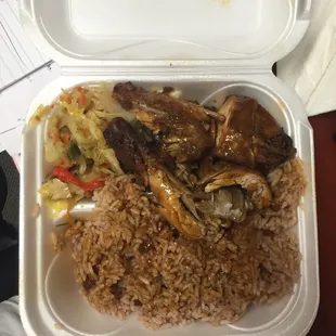 Jerk chicken, rice and beans, and steamed cabbage. Somehow, this is a small portion!