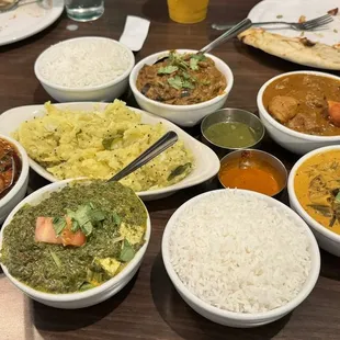 Goat curry, kappa with meen curry &amp; eggplant masala