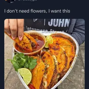 a person holding a plate of food