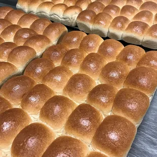Whole wheat dinner rolls brushed with real butter.