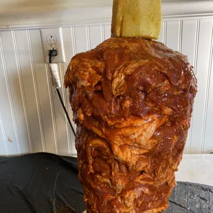 Meat located in a vertical grill