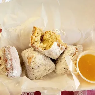 July 2021: Warm Beignets! Look @ the soft interior. That's delicious honey butter for dipping