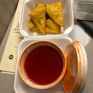 Terrible crab ragoons with some sauce from a jug...