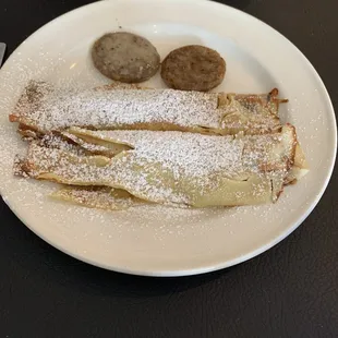 Banana Nutella crepes with a side of sausage