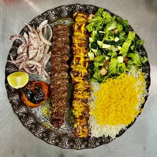 Combination of chicken &amp; Ground beef kabob (koobideh)
Half rice &amp; Half Salad