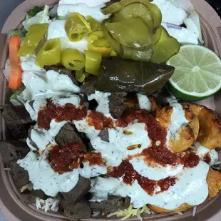 Loaded platter with chicken and lamb $12