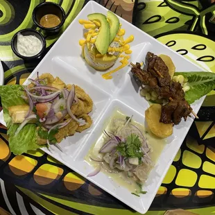 Anticucho de Corazon Causa de Pollo Calamares Fritos Ceviche de Pescado. Todo estaba fresco y sabroso!!!!