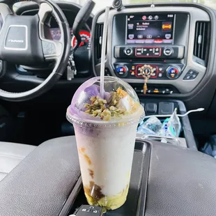Halo halo - a mix of gelatins, flan, jam, UBe ice cream and other sweets in a shaved ice with milk and sugar. Worth to try