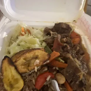 a take out container of food