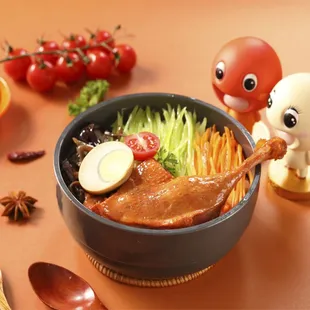 a bowl of food with a doll