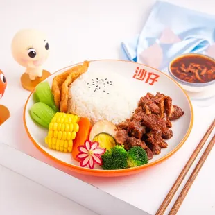 a plate of food with rice and vegetables