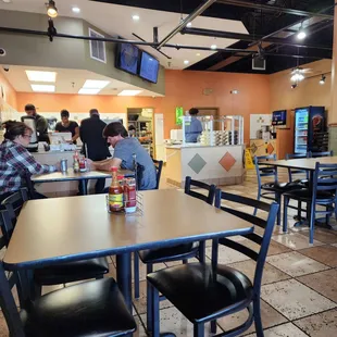 people eating at a fast food restaurant
