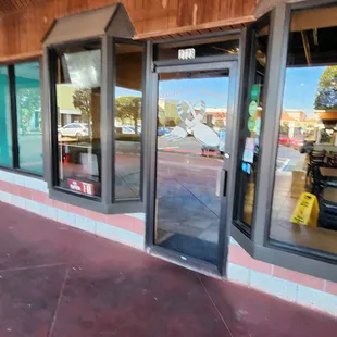 the entrance to a restaurant