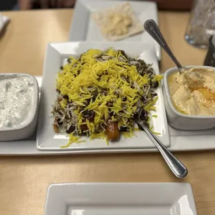 Sampler trio: Mast o Khiar, Addas Polo, and hummus