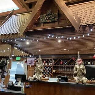 a bar with a wooden roof