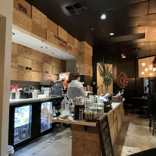 a man preparing food in a restaurant