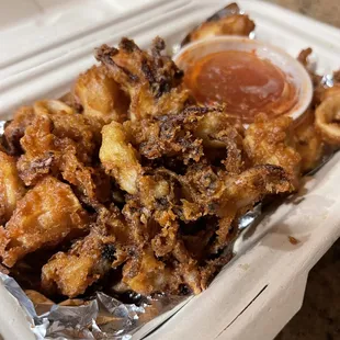 fried food in a styrofoam container