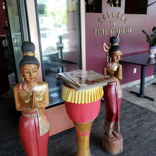 entrance... do I help myself to a menu?