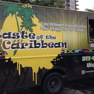 a man looking out of a food truck