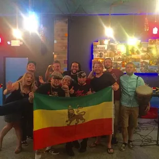 Here, you can see the owner in the middle and then at least two of the band members smoking inside by people eating.