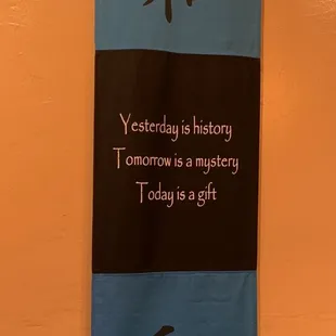 a banner hanging on a wall