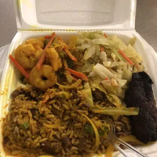 Curry Shrimp with rice and peas and steamed vegetables