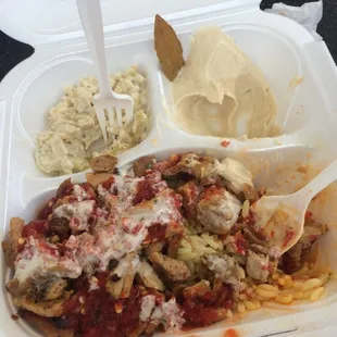 a meal in a styrofoam container