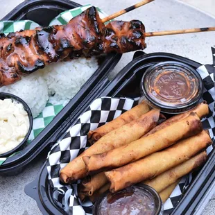 skewers of meat and rice