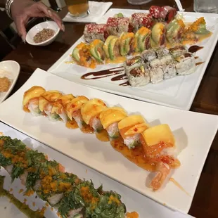 a variety of sushi and rolls
