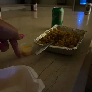 That TINY cup is the side of yum yum we ordered for this large portion of fried rice.