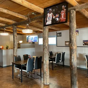 a dining room with a television