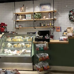 a display of cheeses and pastries