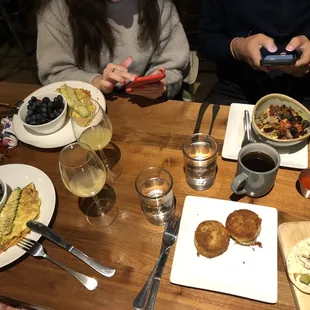 a table full of food and drinks