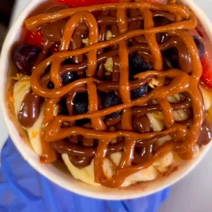 Açaí bowl with cookie butter and Nutella drizzle