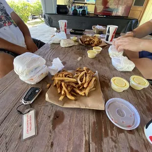 Cheese burger and fries with sauce