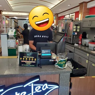 Kiosk, outside next to Brug Bakery, on the TJ Maxx side.