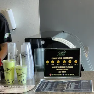 a person standing at a counter