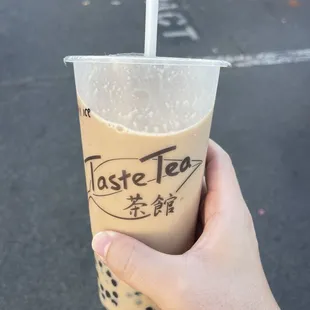 Signature milk tea 25% small boba light ice.