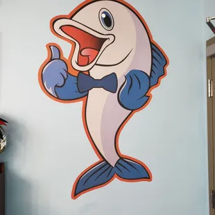 a smiling dolphin with its mouth open