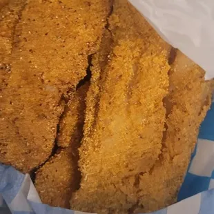 a basket of fried fish