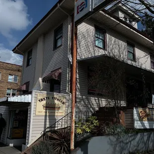 On corner. Parking can be difficult.